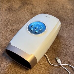 White and Silver Hand Massager